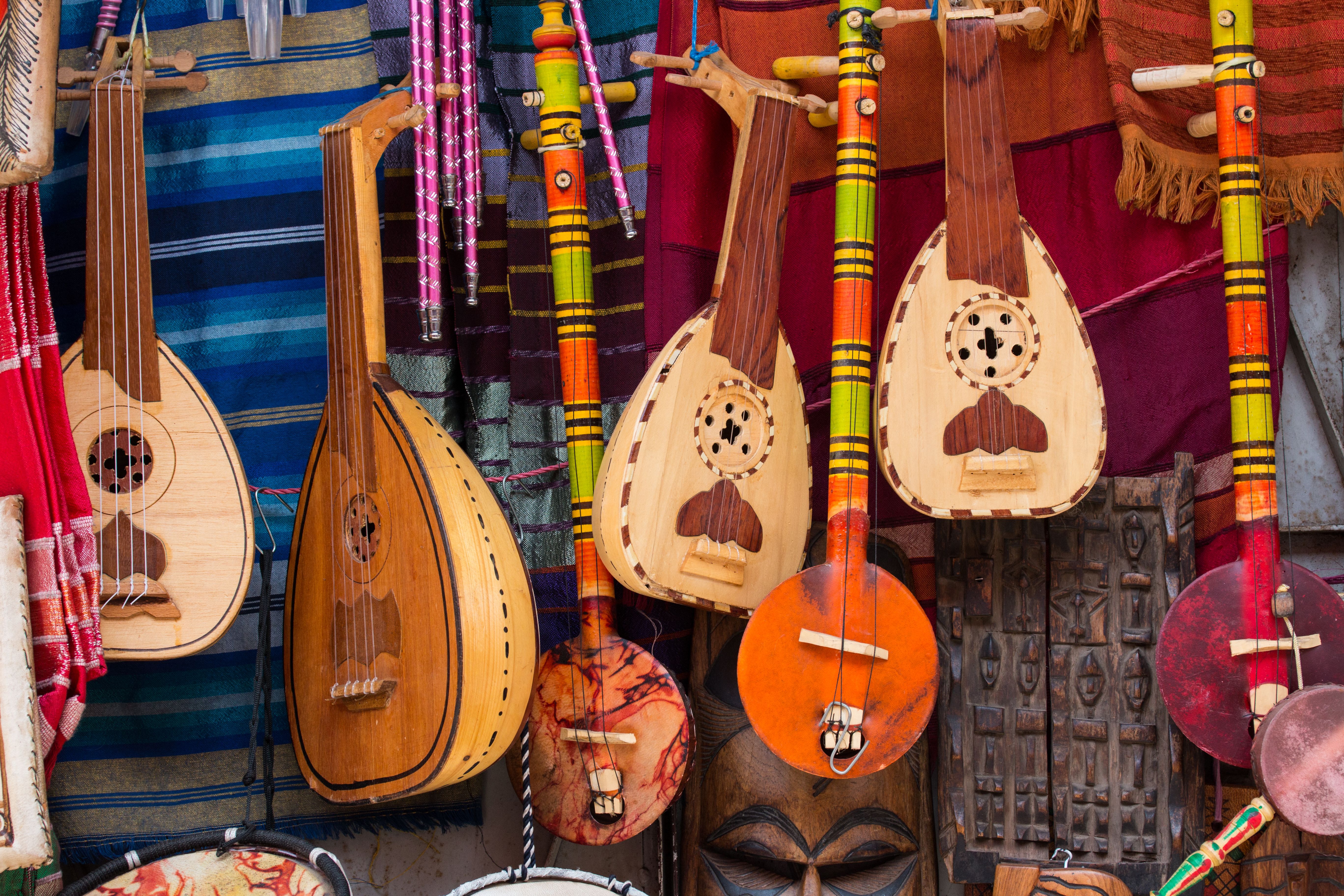 Traditional wooden music instruments on a market stall in Marrakech