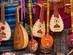 Traditional wooden music instruments on a market stall in Marrakech
