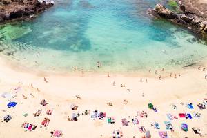 Aerial view of people at Papagayo beach in Lanzarote