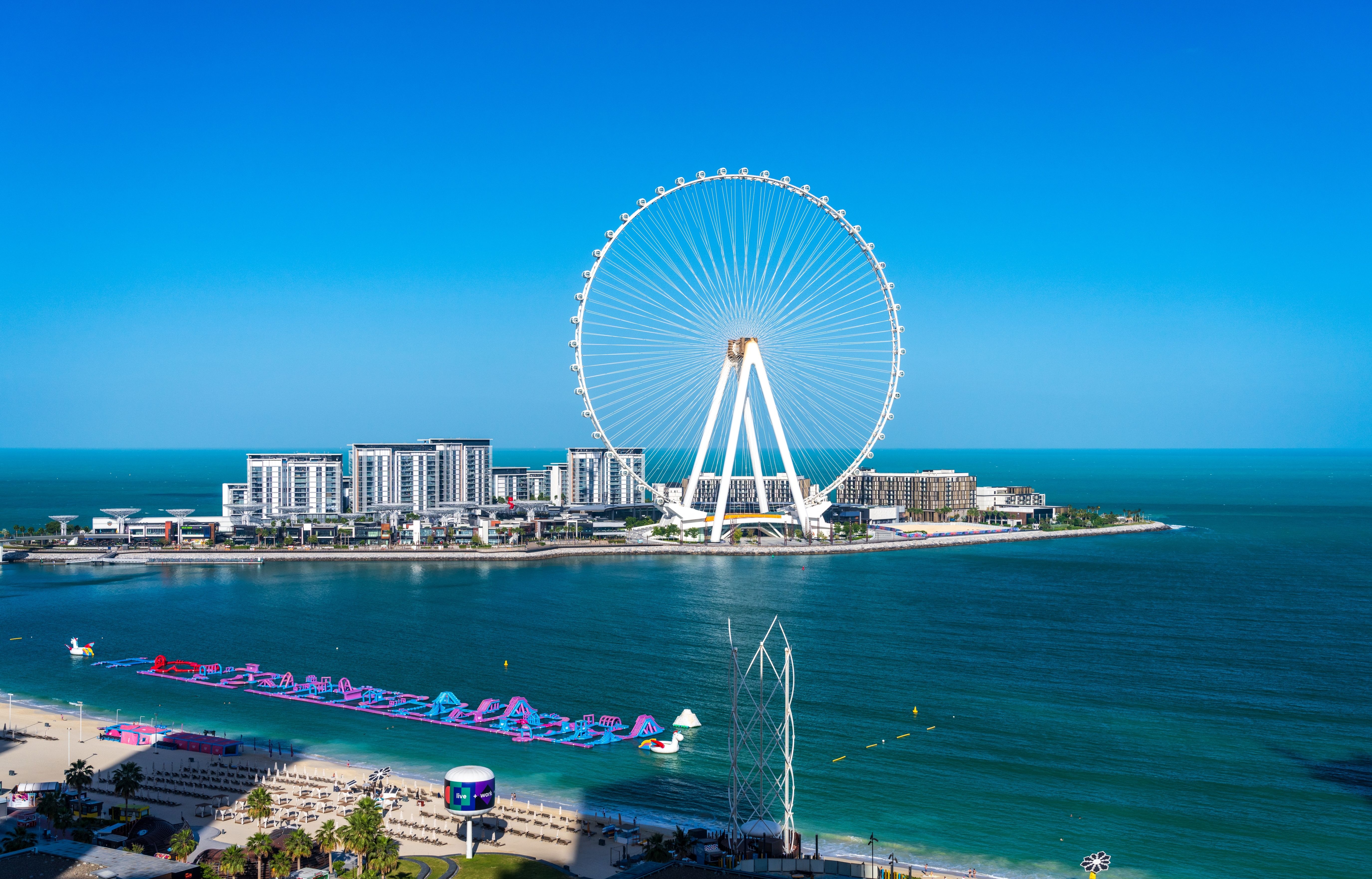 View of the Dubai Eye Observation Wheel on BlueWaters Island off the coast by JBR beach in Dubai
