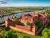 An aerial view of the Castle of the Teutonic Order in Malbork by the Nogat river in Poland