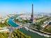 Aerial view of the Eiffel Tower, the River Seine and the cityscape of Paris on a sunny day