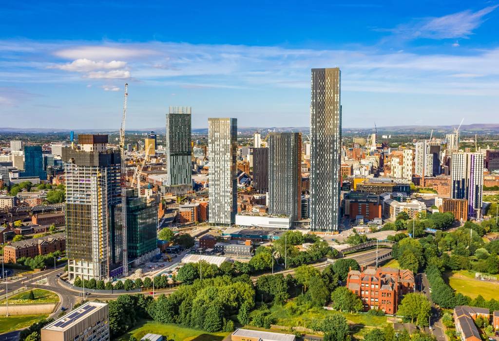 Drone view of skyscrapers in Manchester on a sunny day