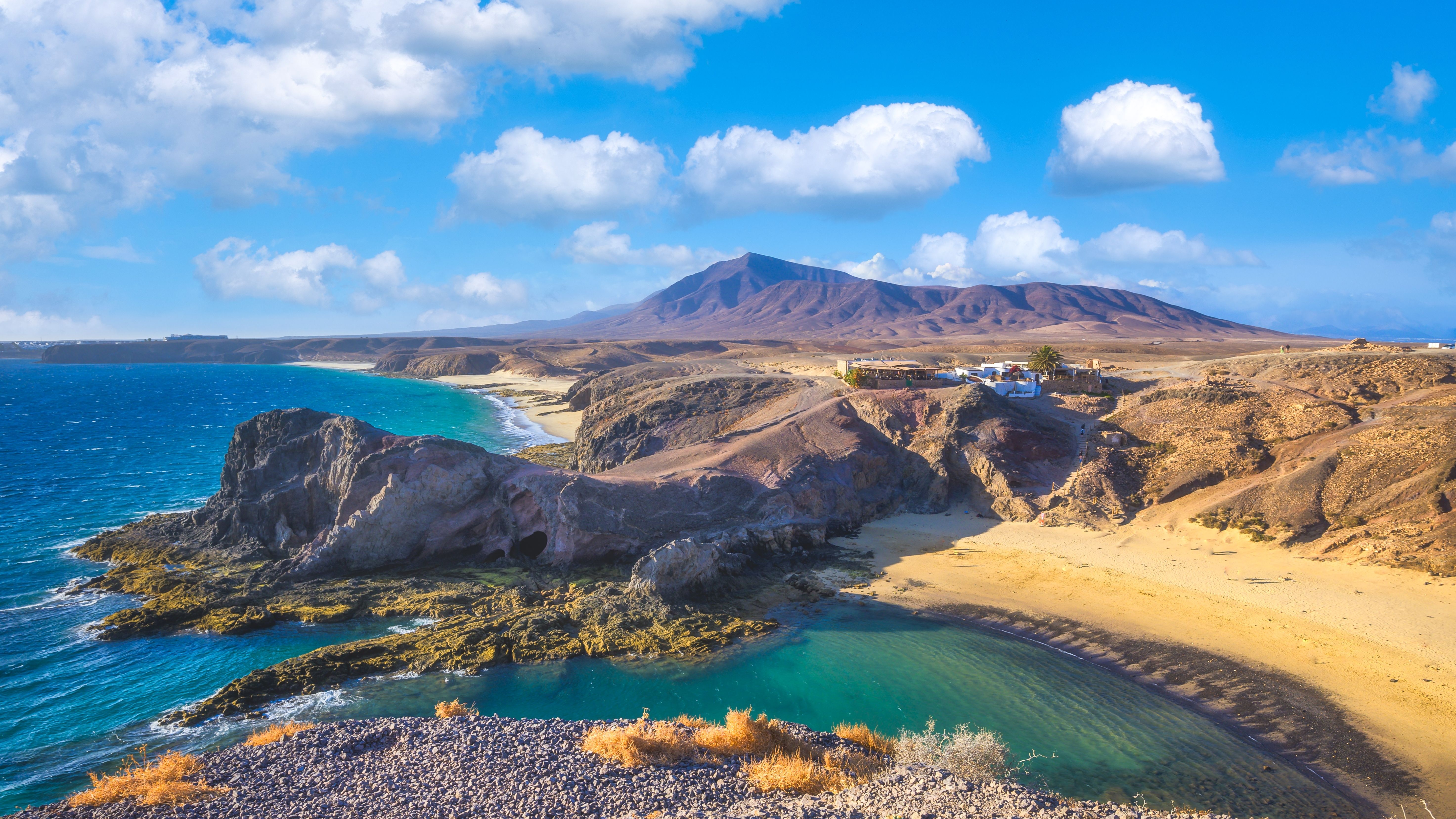 Landscape with turquoise ocean water on Papagayo beach, Lanzarote, Canary Islands