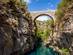 Ancient arch bridge Oluk over the Koprucay river gorge in Koprulu Canyon National Park in Turkey.