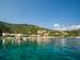 View across the sea of Kalami Bay in Corfu, Greece