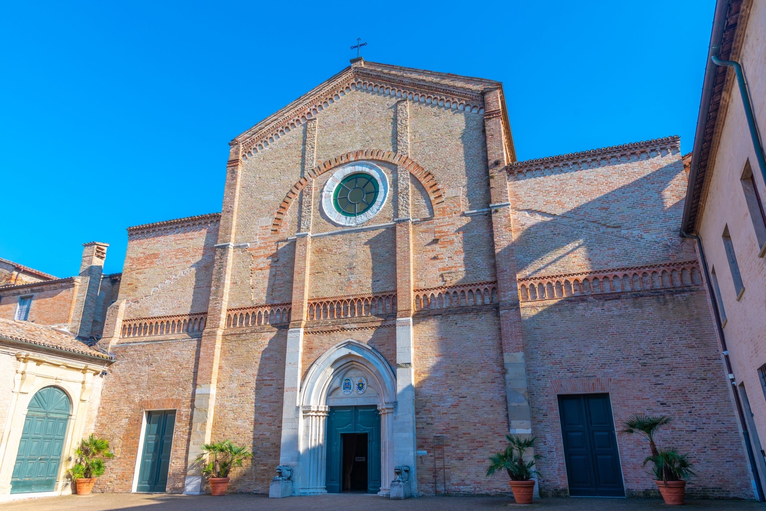 A close up view of the front of Pesaro Cathedral in Italy