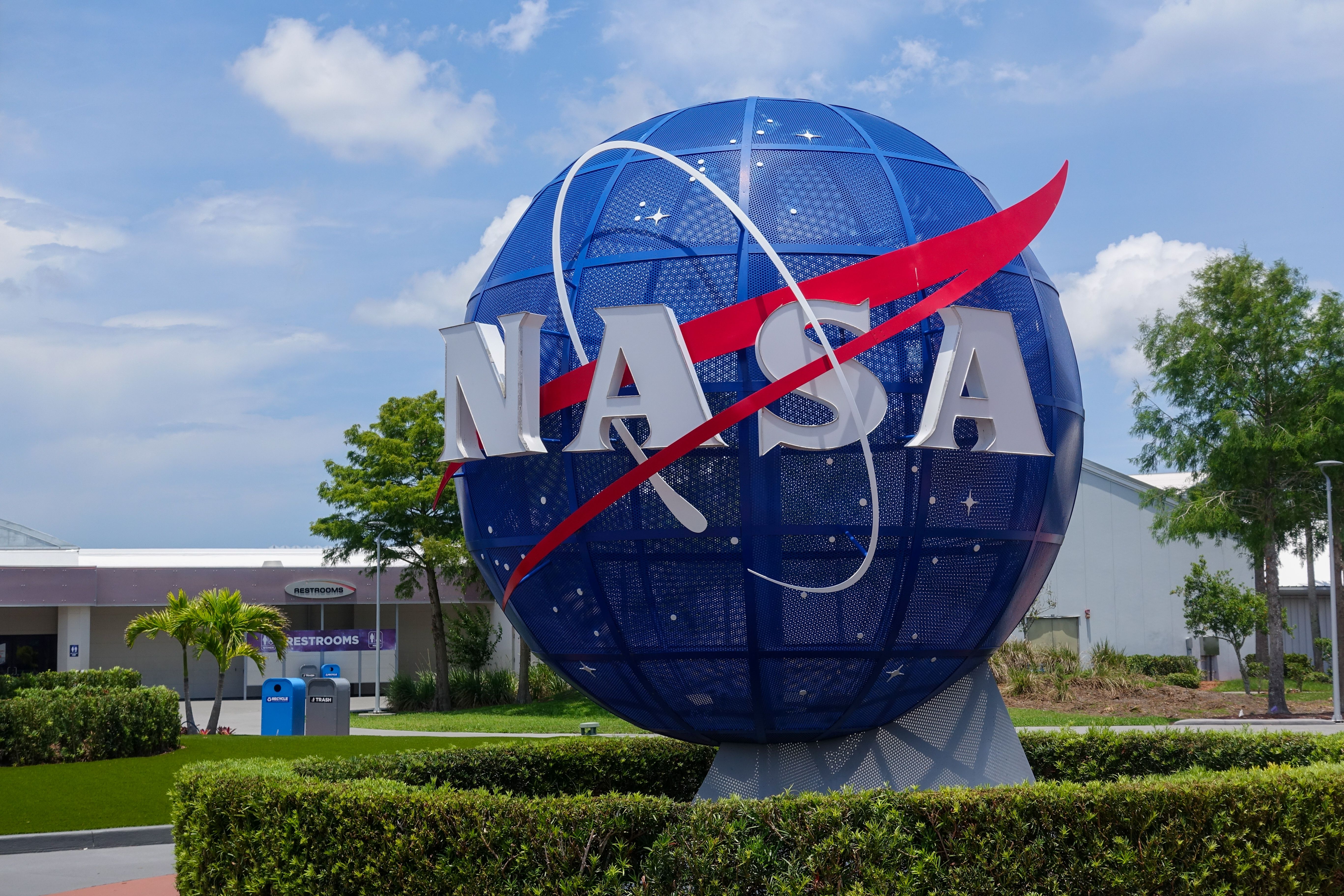 A blue globe featuring the iconic NASA logo at the Kennedy Space Center Visitor Complex