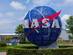 A blue globe featuring the iconic NASA logo at the Kennedy Space Center Visitor Complex