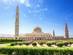 A view of the gardens and the Muscat Grand Mosque in Oman.