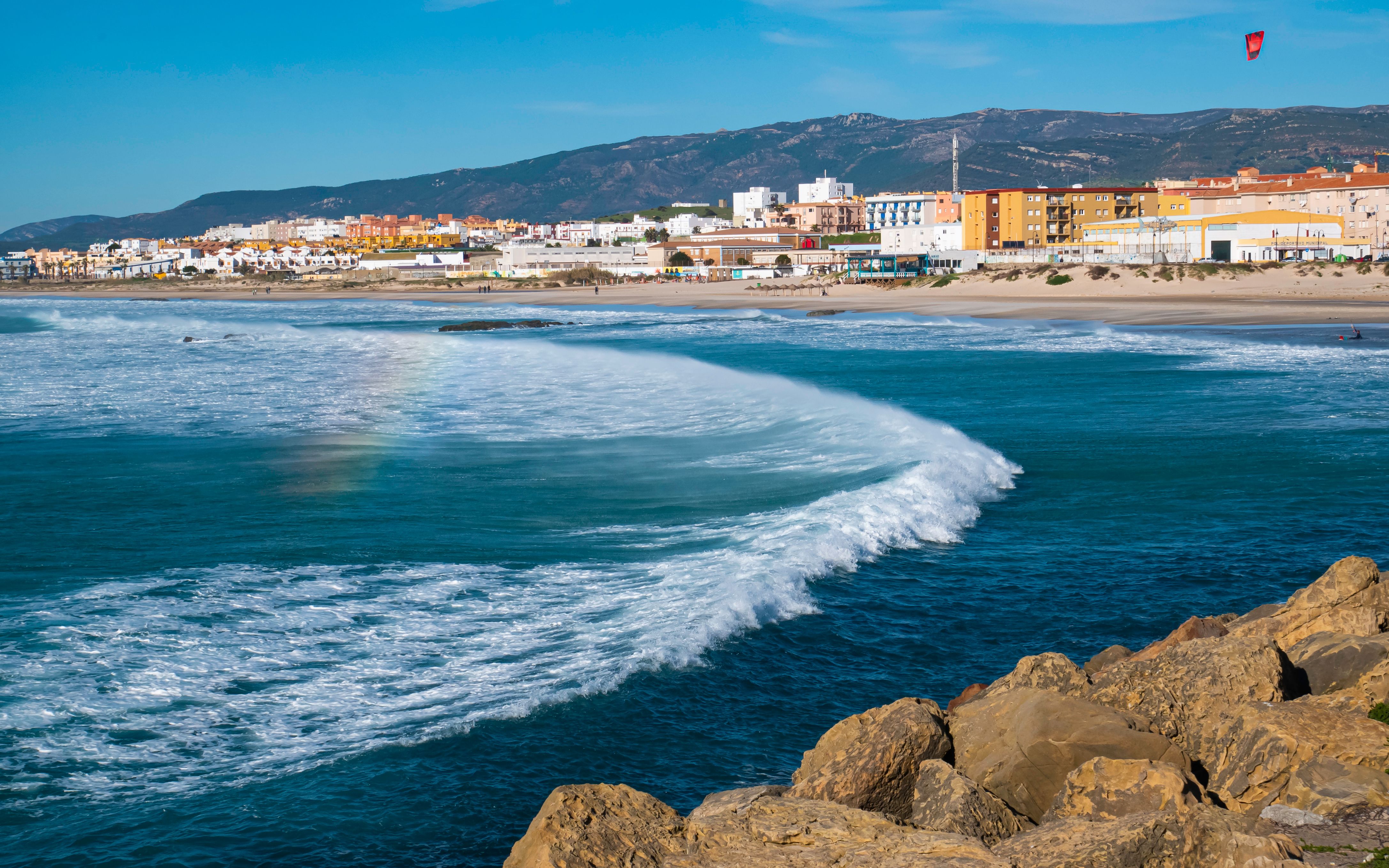A view A view across the sea of Tarifa's coastline and beach on the Costa de la Luz in Spain the sea of Tarifa's coastline and beach near Cadiz in Spain