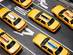 Bird's eye view of a fleet of yellow taxis on the streets of New York