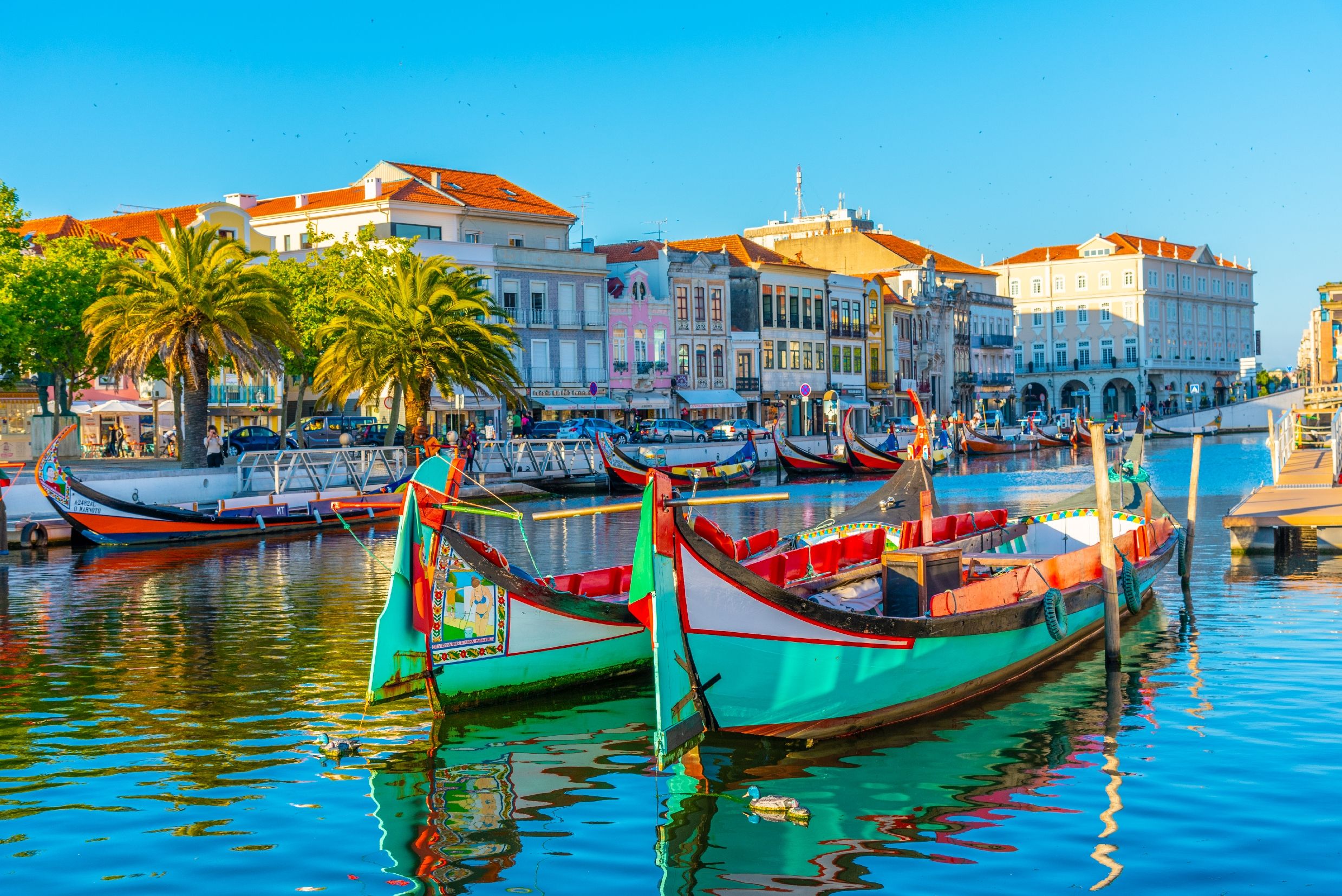 Moliceiro boats mooring alongside the central canal in Aveiro, Portugal