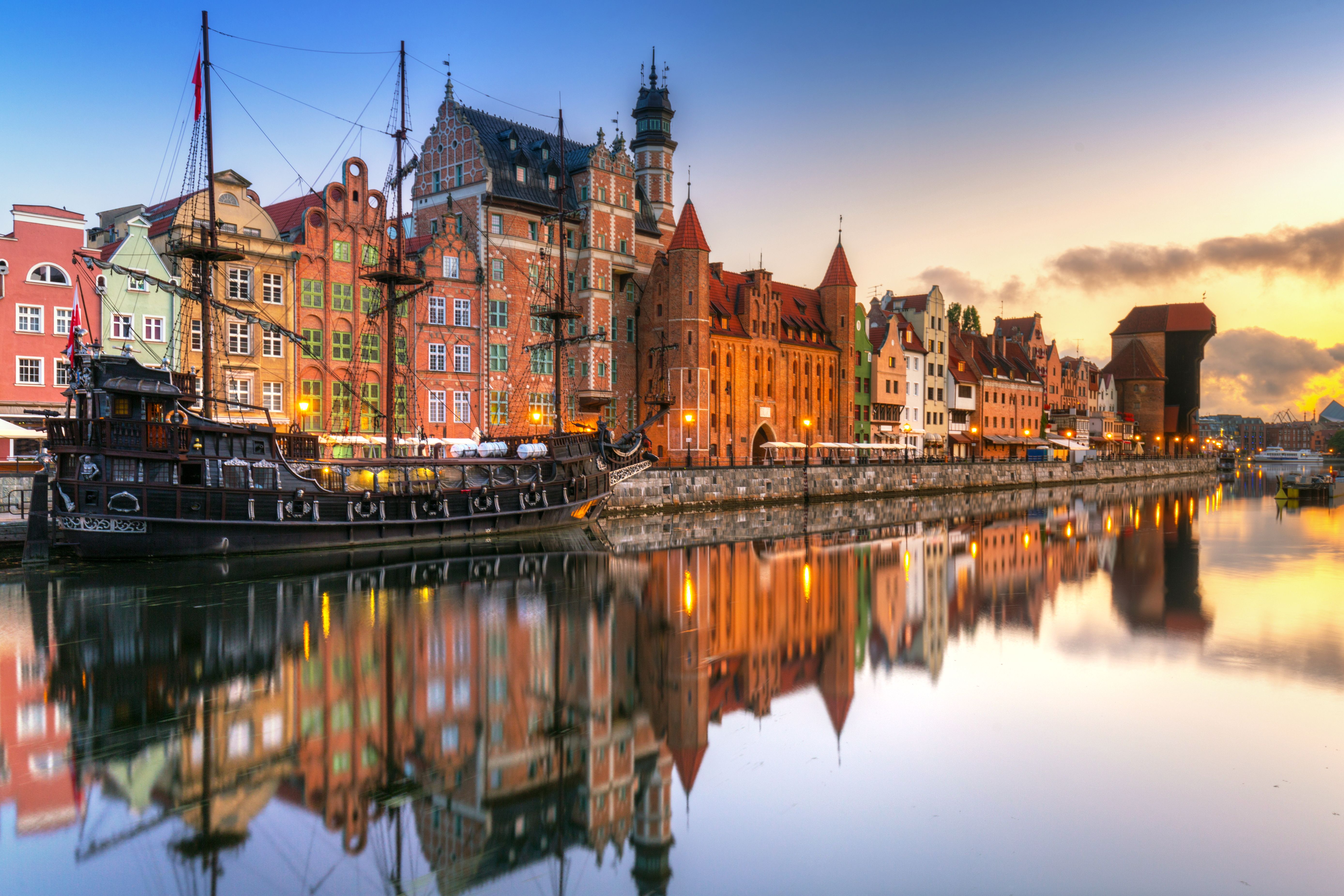 A view over the Motlawa river of Gdansk in Poland as the sun sets