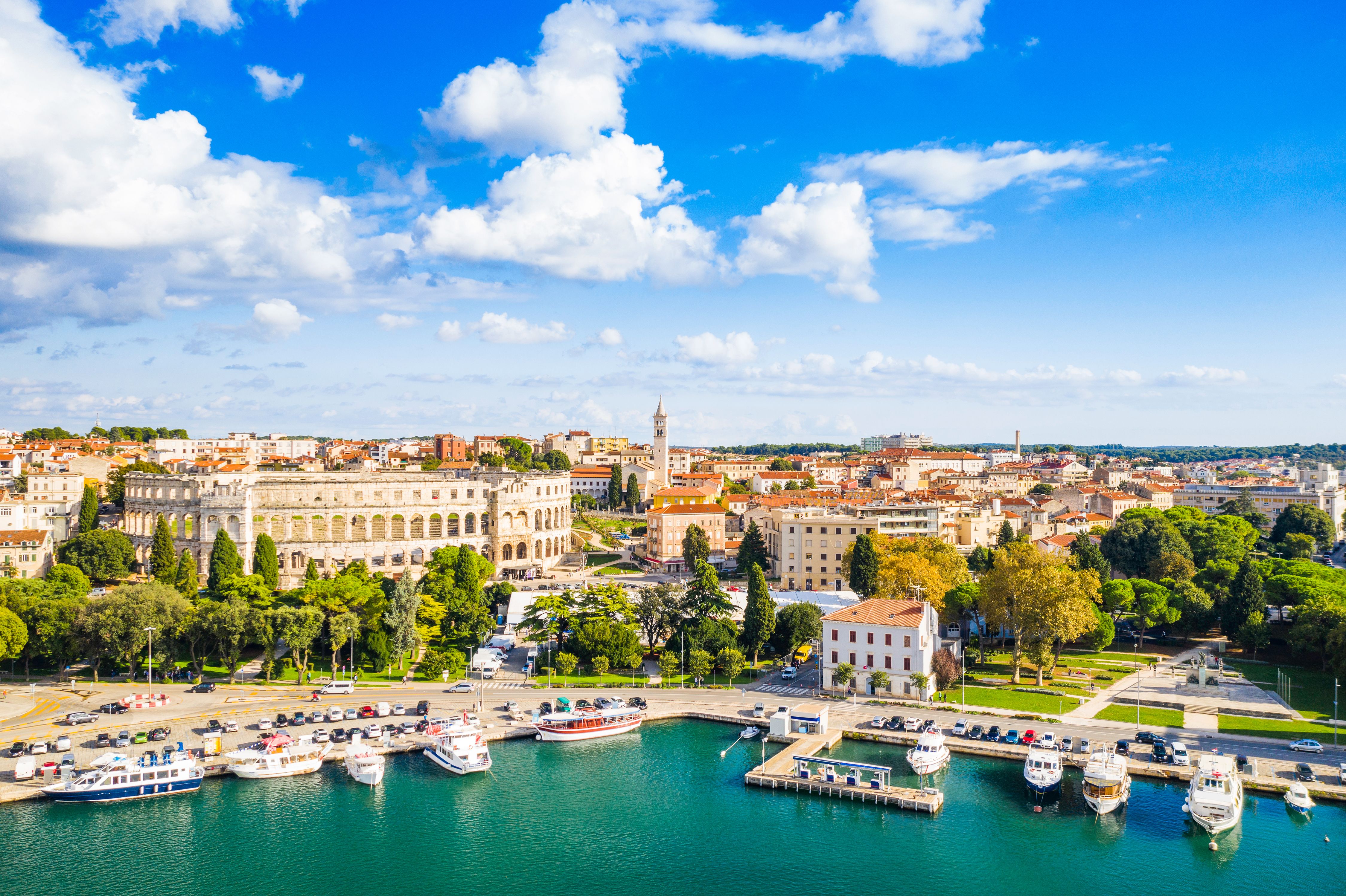 A view over Pula city with the ancient Roman arena in Croatia