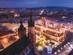 Aerial view of Krakow city centre at night decorated for Christmas with festive markets
