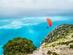 Paraglider flying at Myrtos beach, Kefalonia