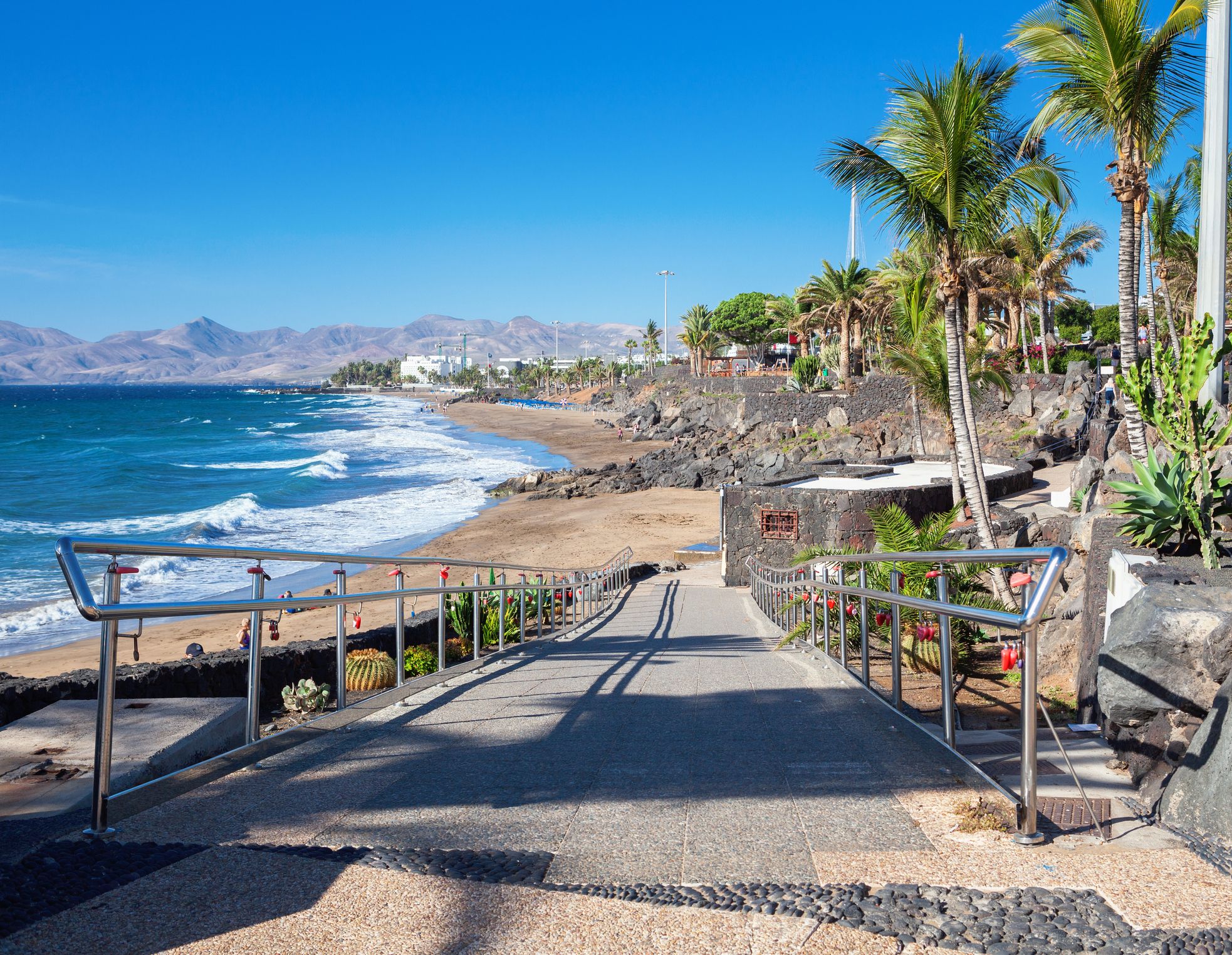 A stone ramp leading down to Puerto del Carmen beach in Lanzarote, Canary islands
