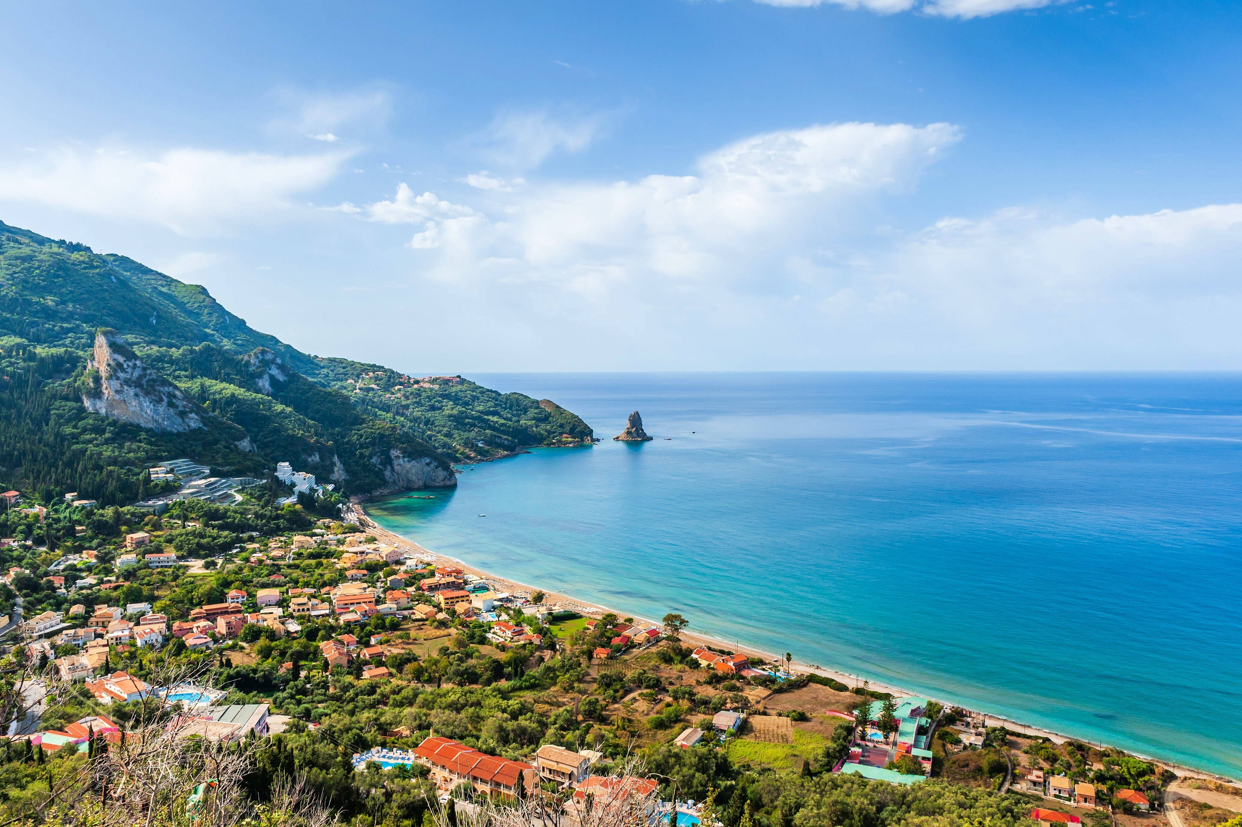 Aerial view over the resort and coastline of Agios Gordios in Corfu