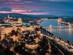 A panoramic view of Budapest city lit up after dark