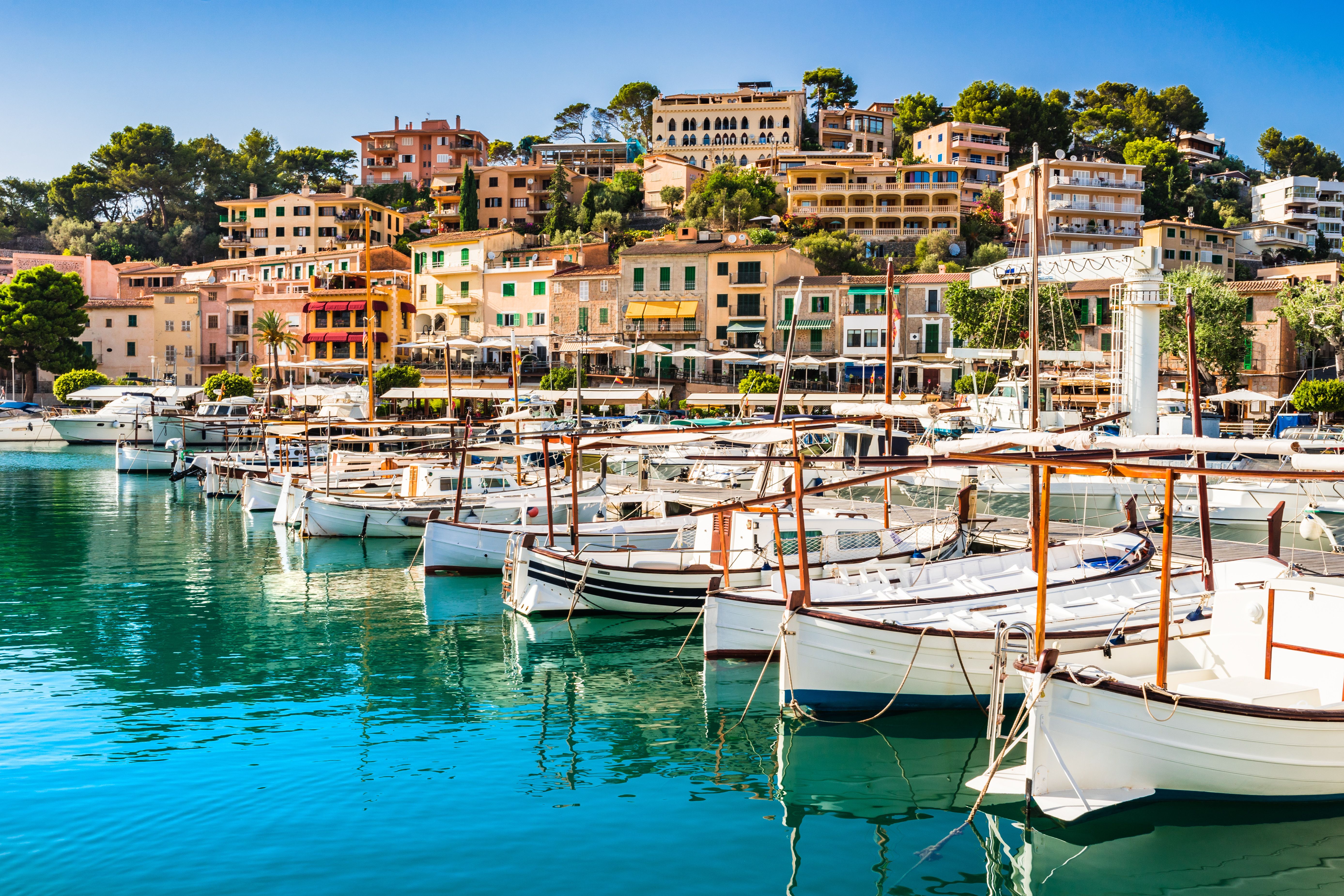 Beautiful view of wooden boats in the harbour of Port de Soller in Majorca