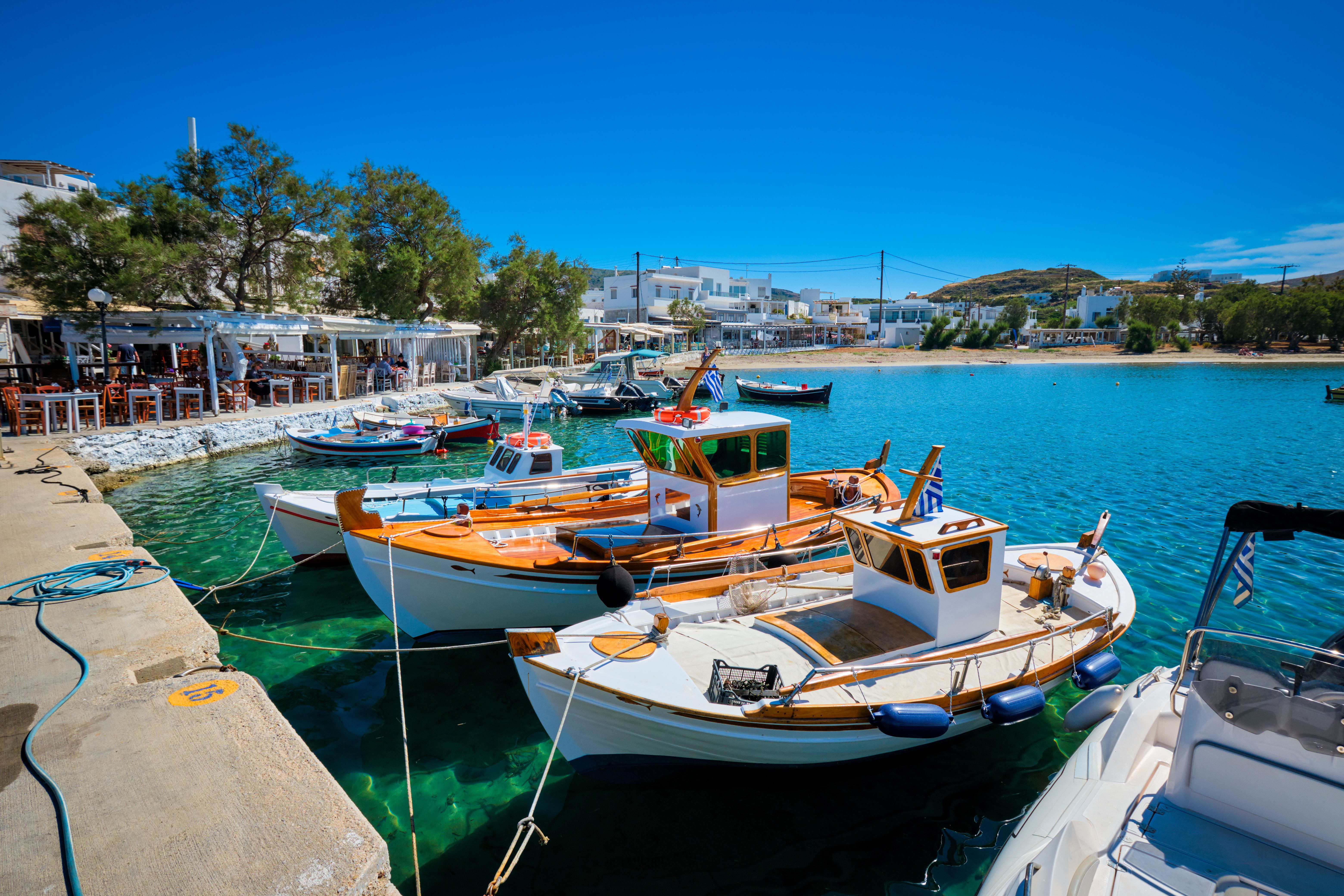 Fishing boats in Pollonia harbour on Milos island, Cyclades, Greece.