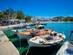 Fishing boats in Pollonia harbour on Milos island, Cyclades, Greece.