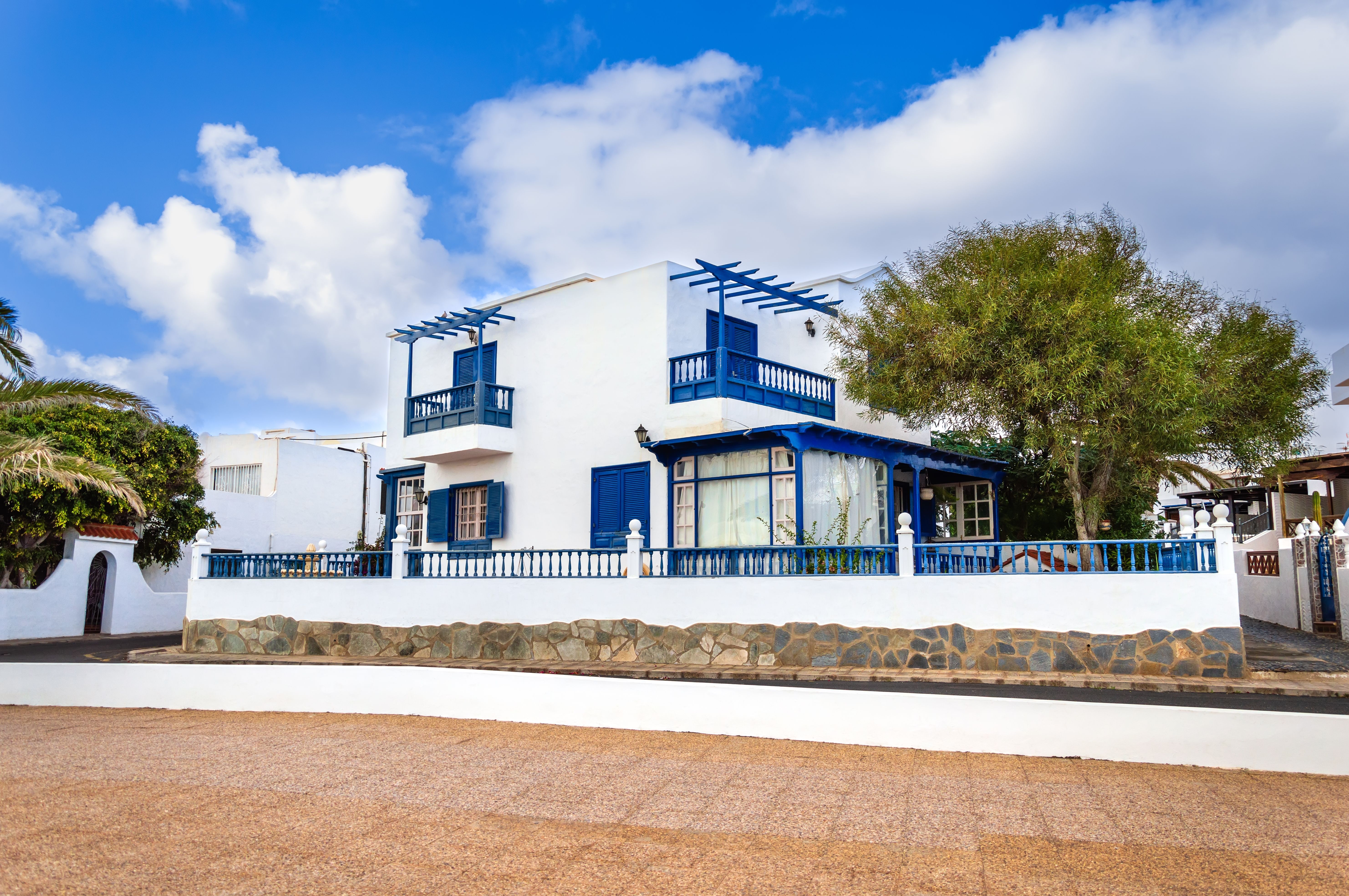 Typical white and blue houses in Playa Honda town in Lanzarote