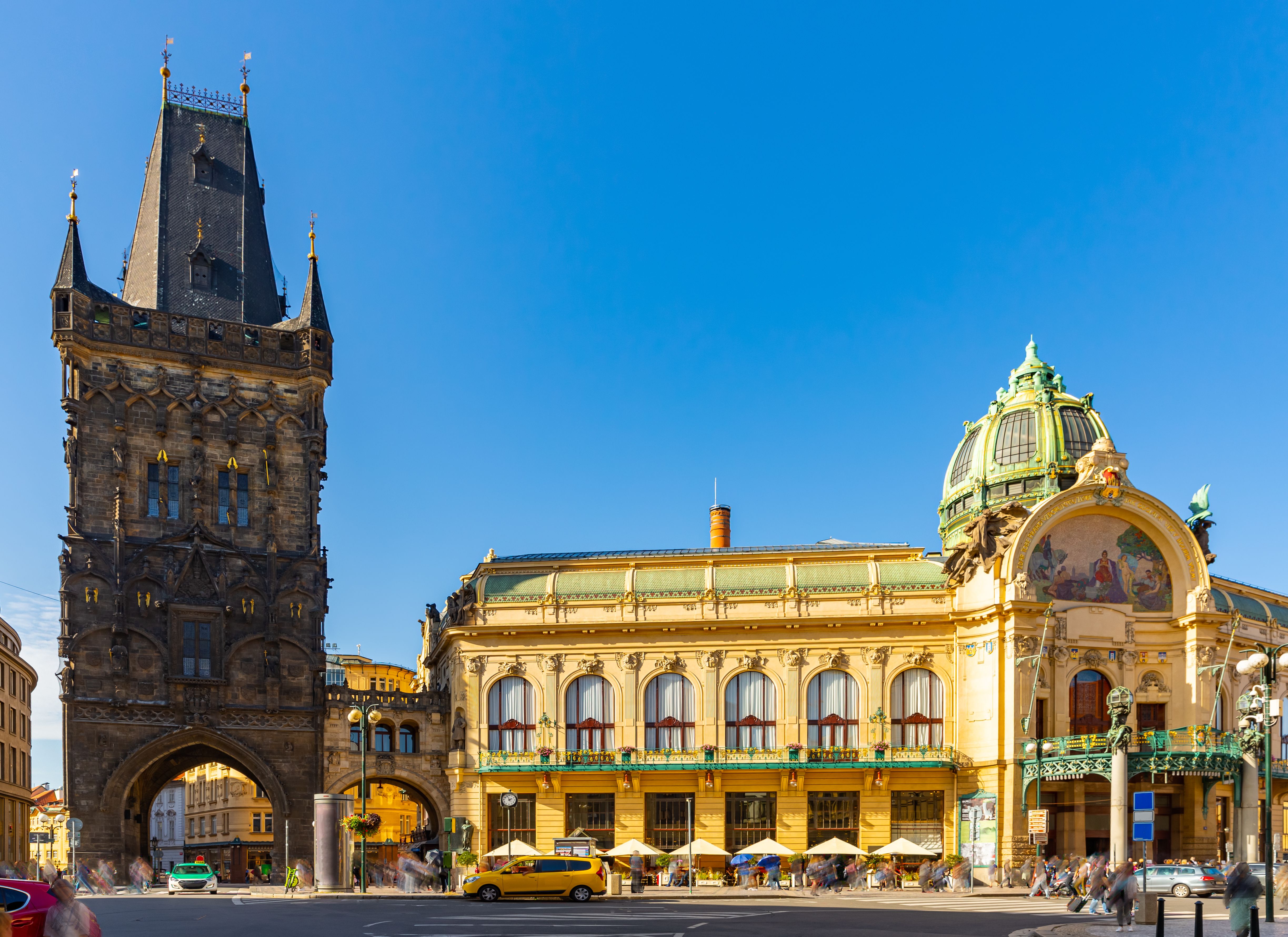 View of medieval Gothic Powder Tower (Powder Gate) and the Municipal House on Republic Square in Prague