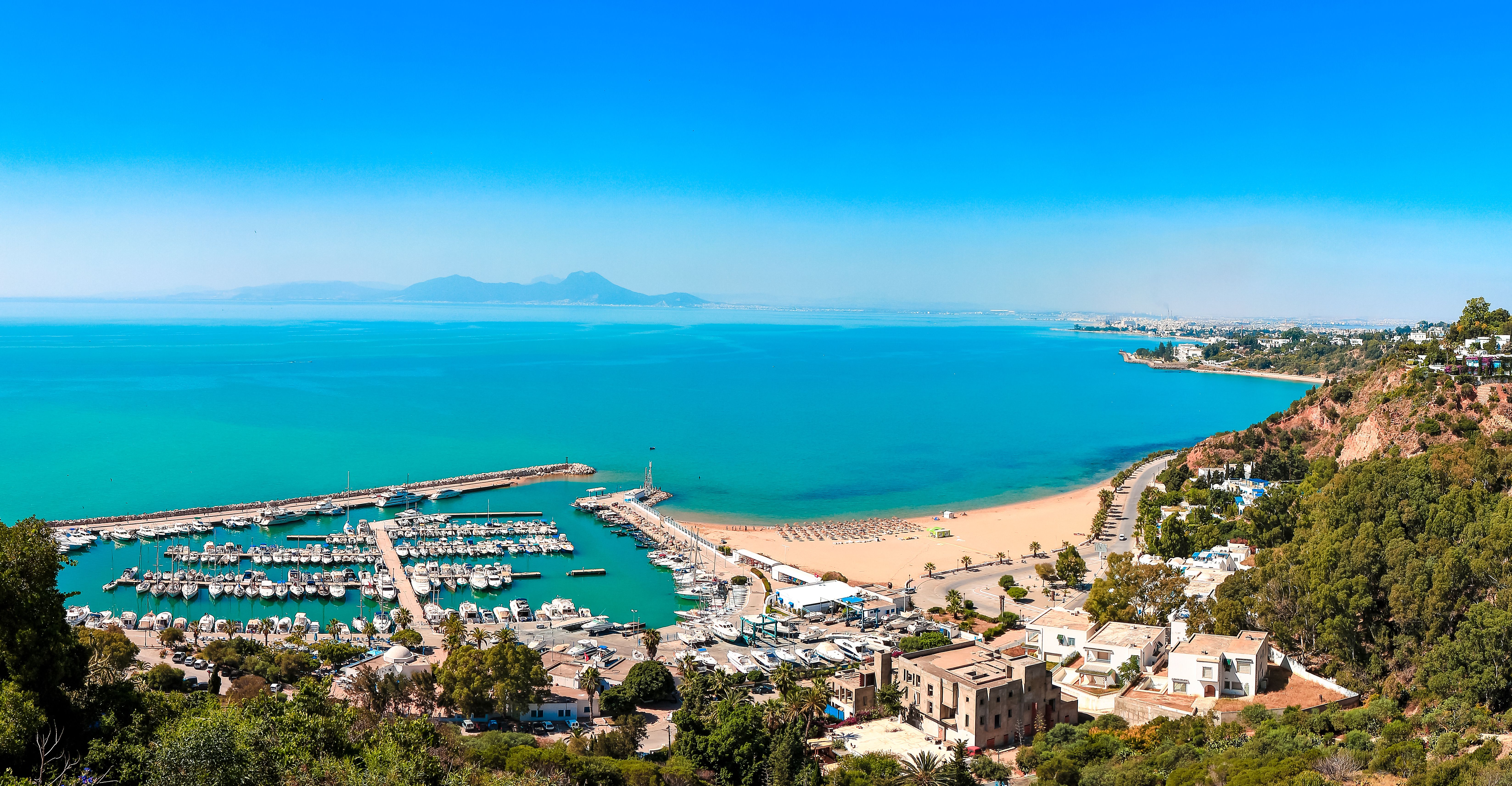 View over the beach and harbour from Sidi Bou Said town in Tunisia