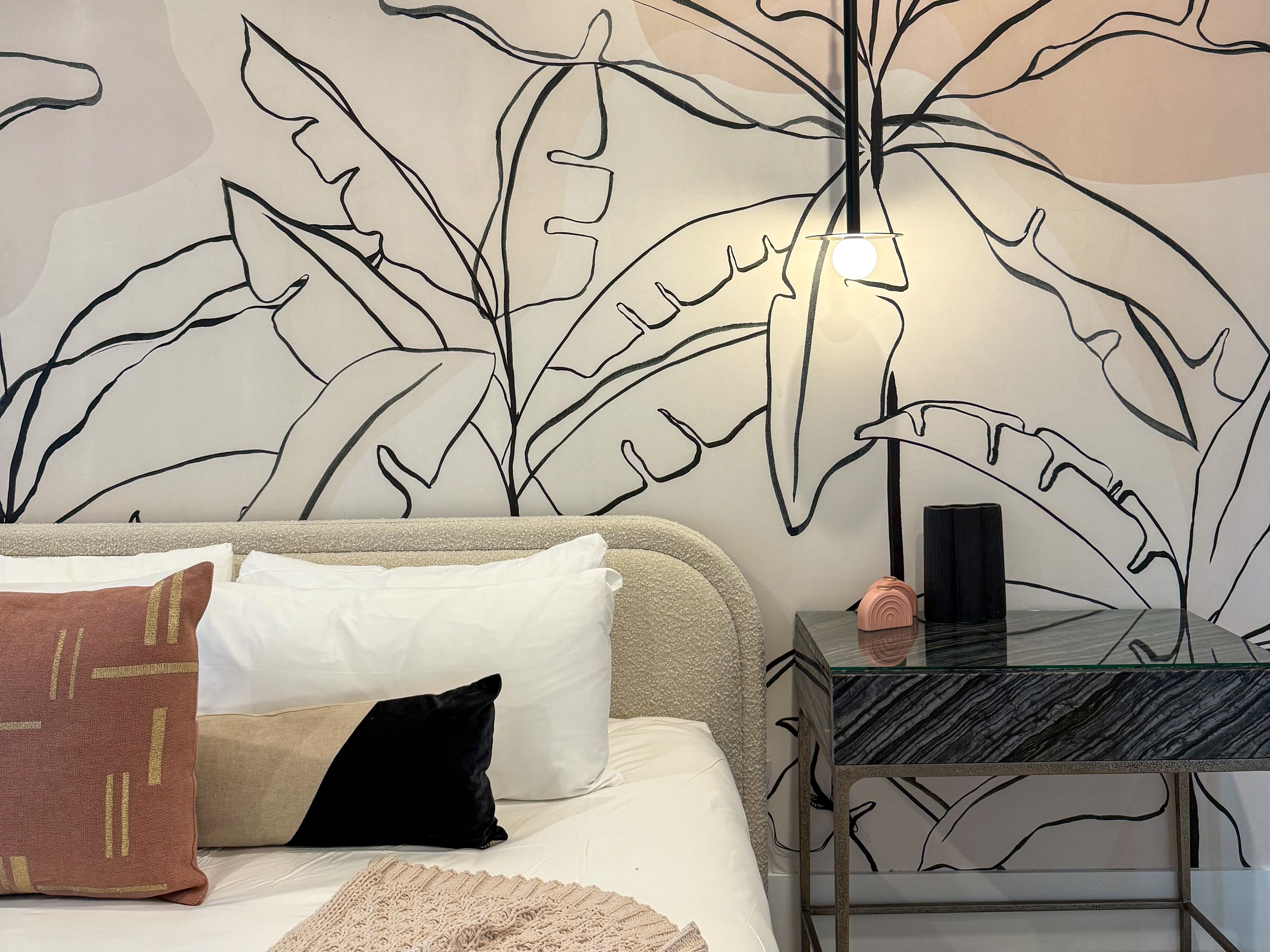 A stylishly decorated bedroom at the Morlando Space Mansion in Kissimmee, Florida