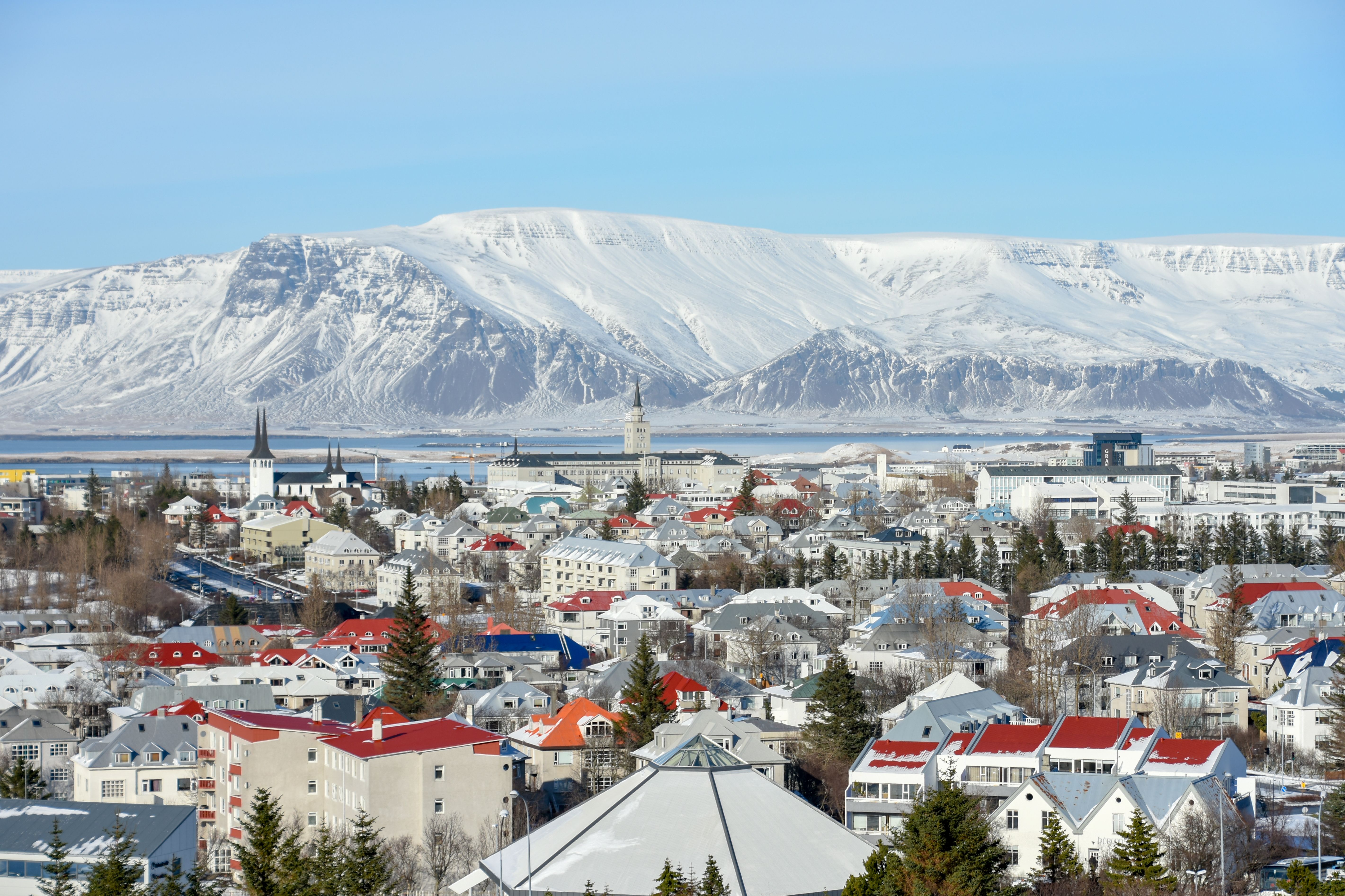 View over Reykjavjik in winter with snowcapped mountains in the background