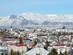 View over Reykjavjik in winter with snowcapped mountains in the background