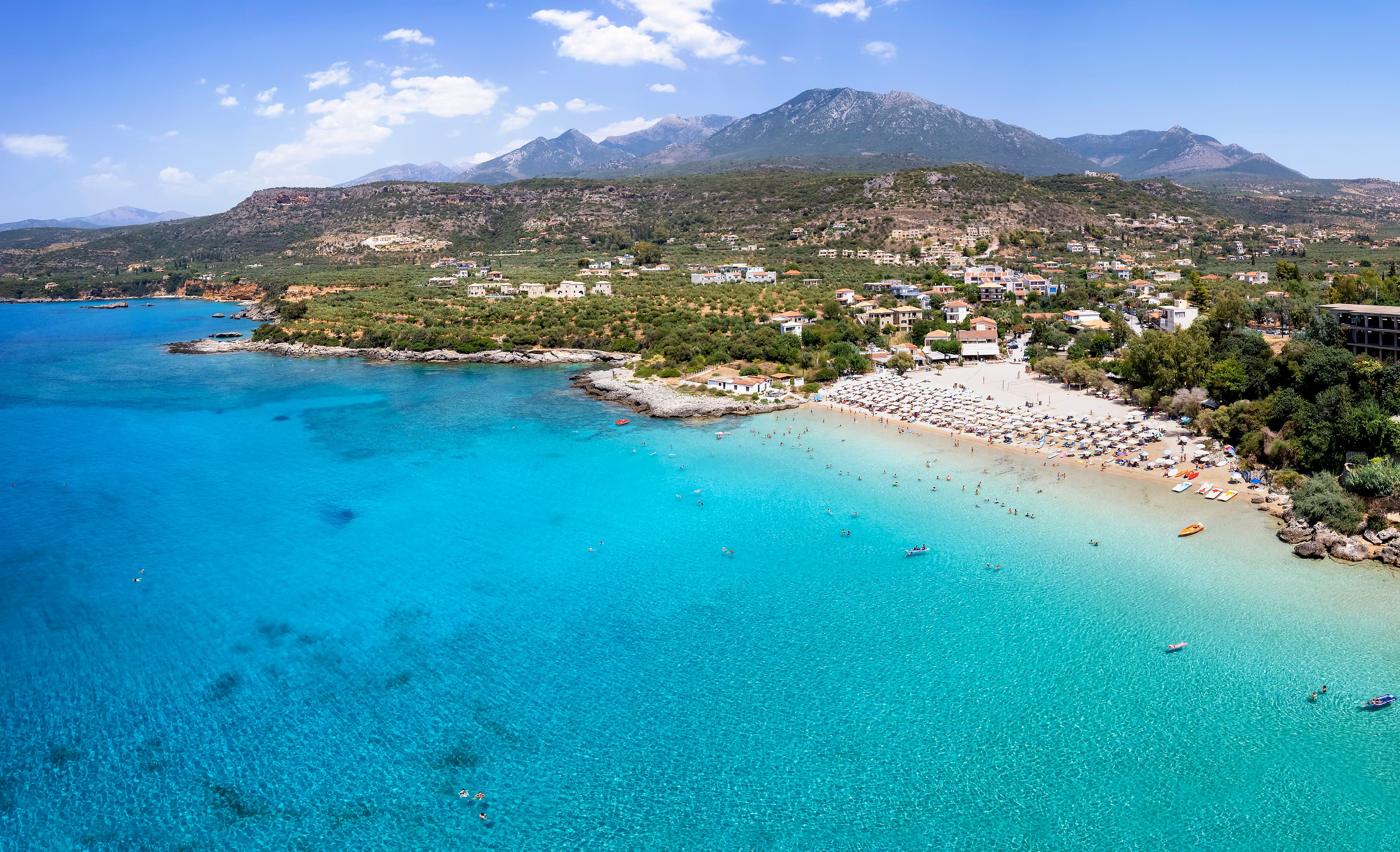 Aerial view of the beautiful Kalogria beach in Stoupa, Greece