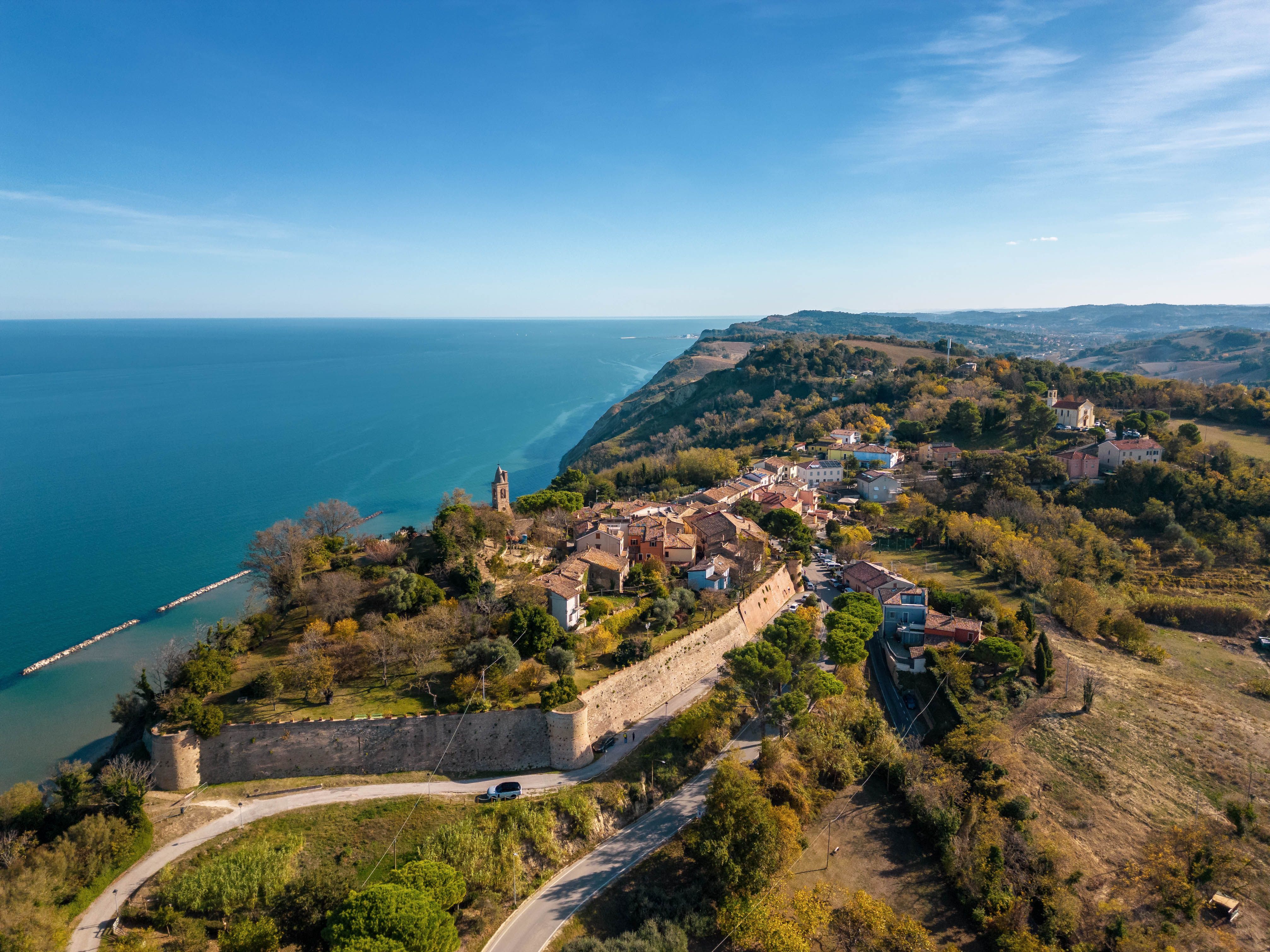 Aerial view of the village of Fiorenzuola di Focara in San Bartolo park in the province of Pesaro, Italy