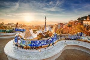 Sunrise view of Park Guell and Barcelona at sunrise