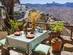 A restaurant table in Gran Canaria overlooking the mountains