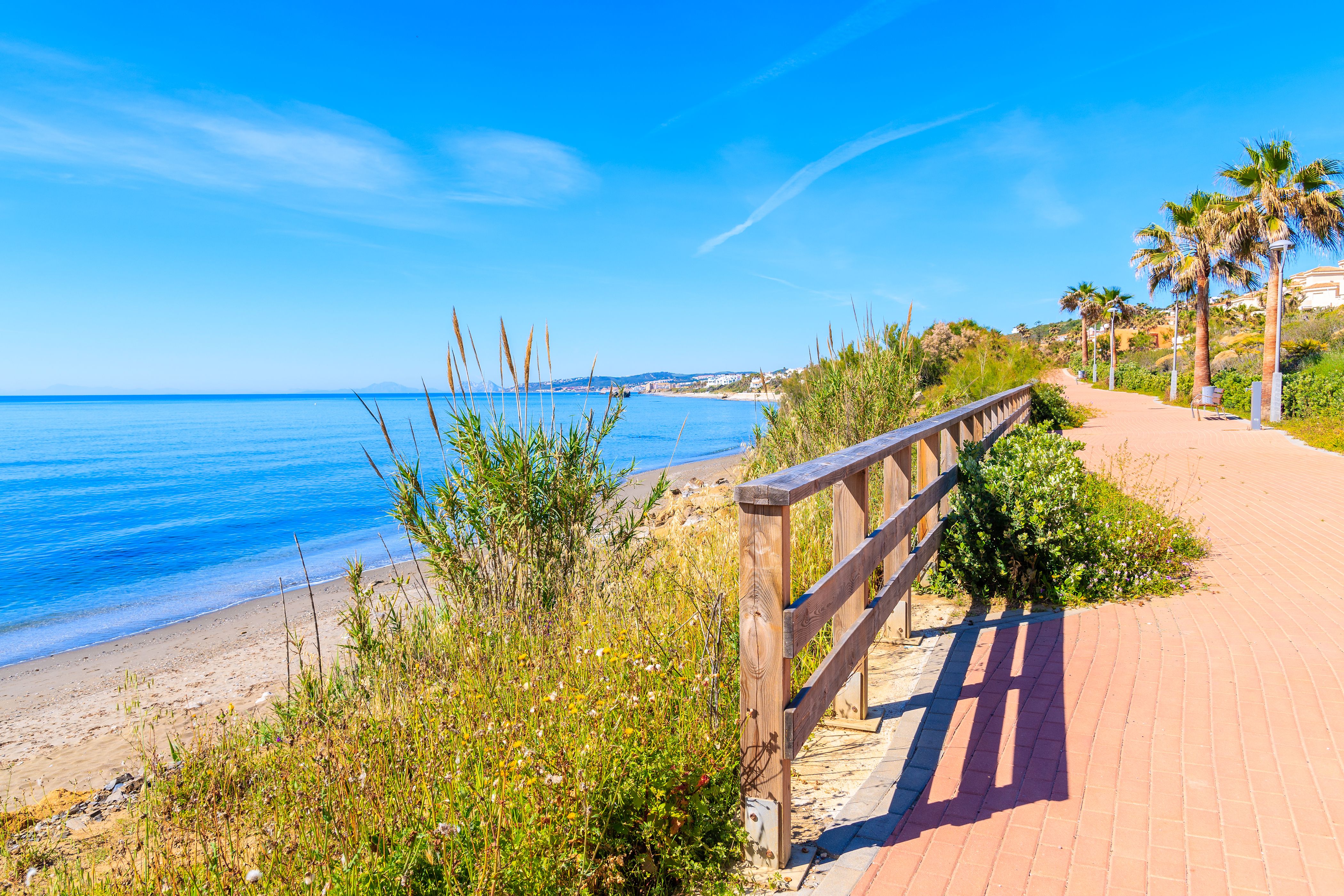 Coastal path running along the beach in Estepona, Costa del Sol