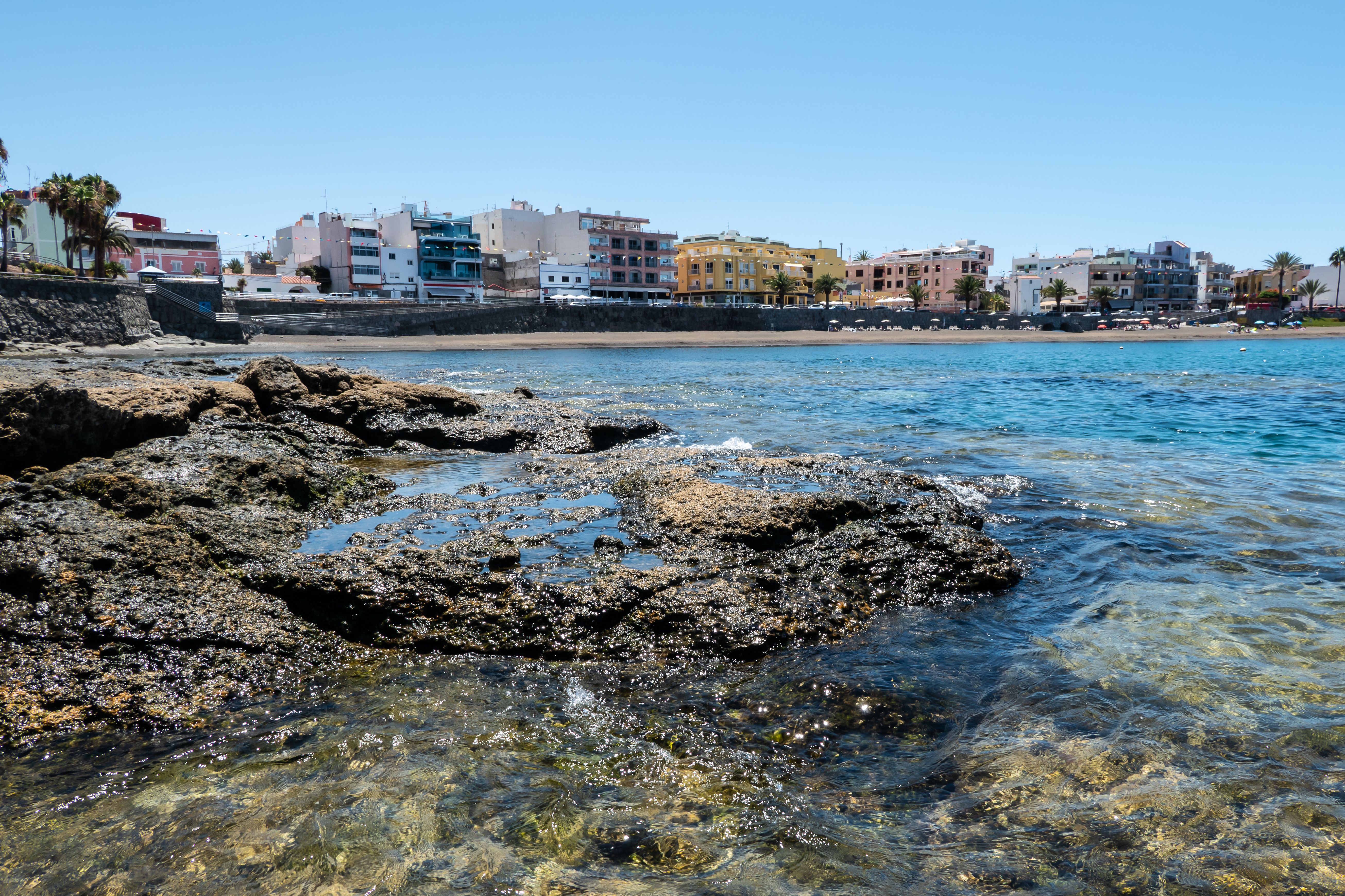 View across rockpools of Arguineguin beach in Gran Canaria