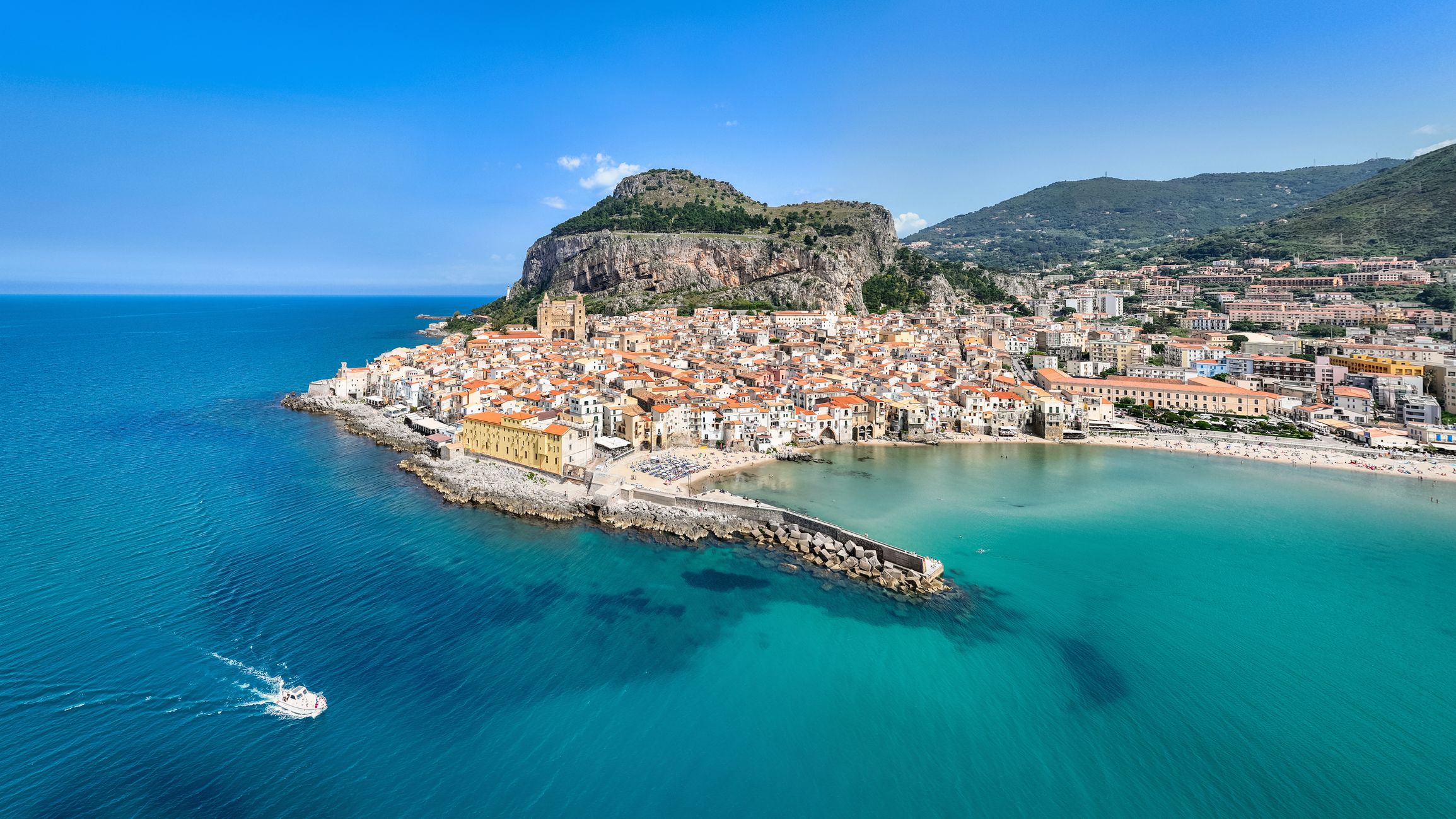Aerial view over Cefalù city and beach in Sicily