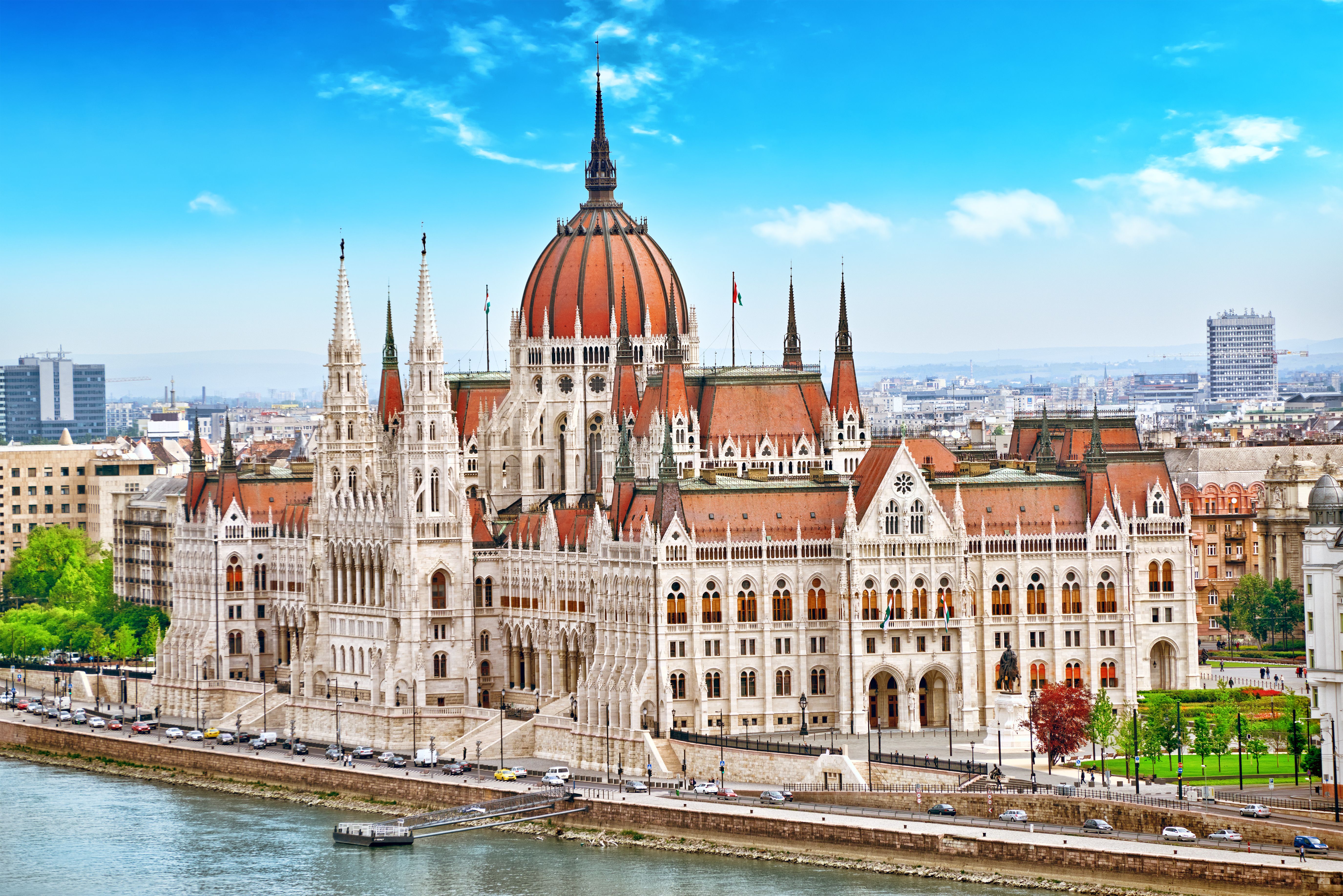 The gothic-style Hungarian Parliament building with its central red dome and decorative spires