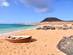 A rowing boat on an empty beach on the island of La Graciosa in the Canary Islands