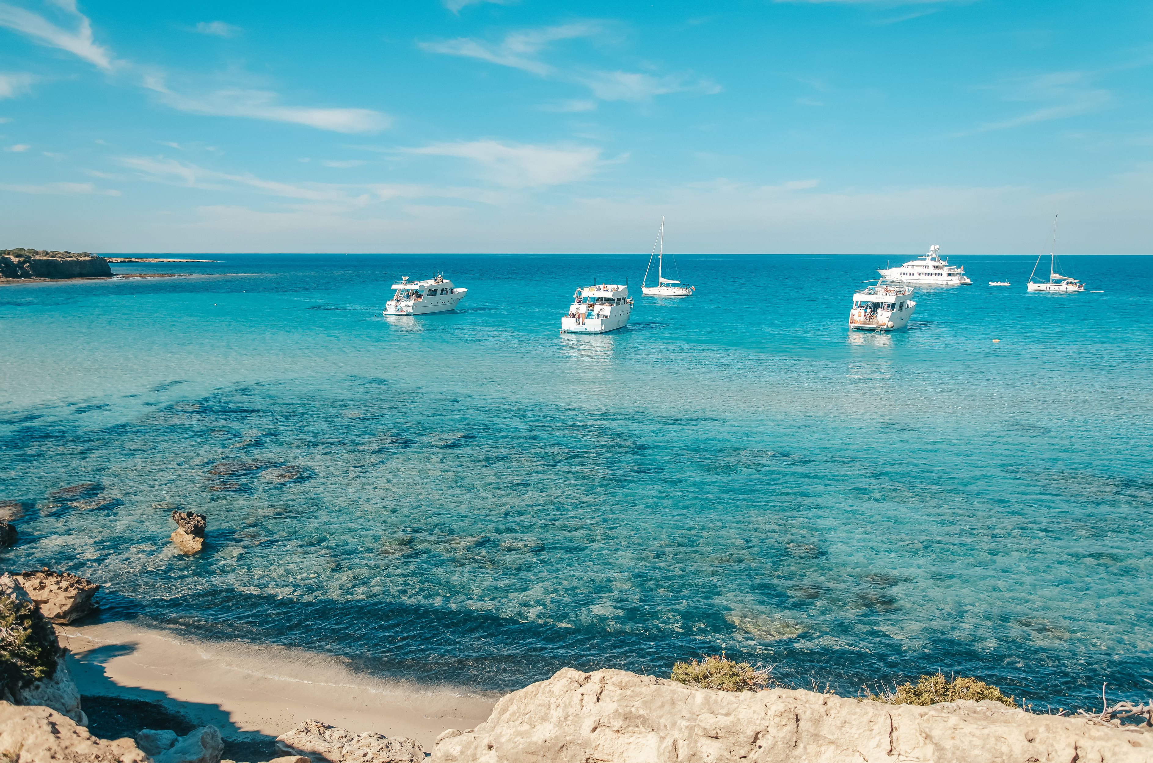 Tourist boats moored at the Blue lagoon on the Akamas peninsula in Cyprus