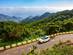 A car driving alongside the Anaga Mountains in Tenerife