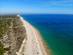 An aerial view of a stretch of Comporta beach (Praia da Comporta) on Portugal's Silver Coast
