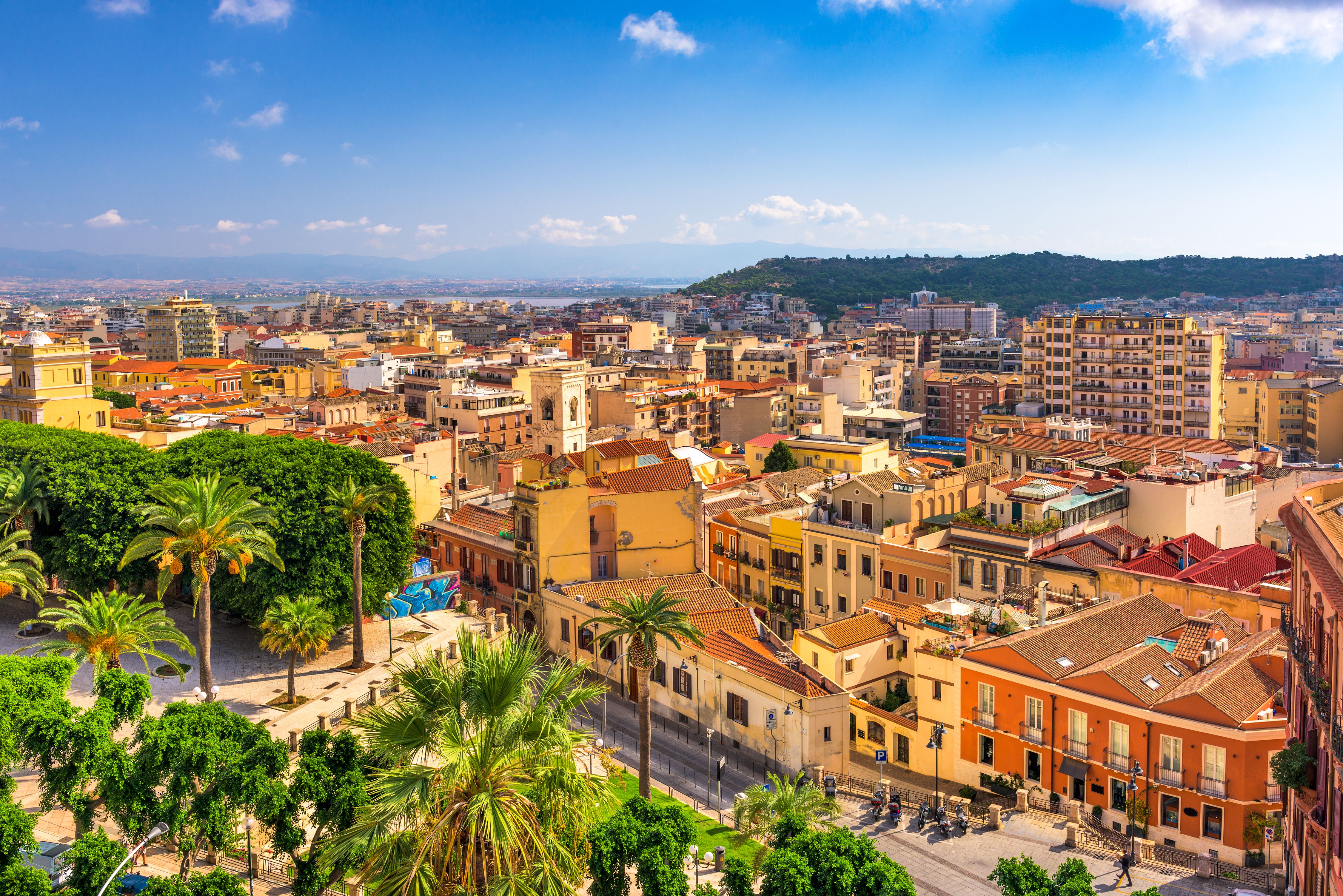 Aerial view of of the bright yellow and orange buildings in Cagliari in Sardinia