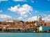 Beautiful view of Lisbon from the Tagus River. The scene is dominated by the Pantheon on the right hand side and the convent of Sao Vicente da Fora at upper left. This is the view that greets visitors arriving by cruise ship.