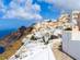 A view of traditional hillside houses in Firostefani, Santorini
