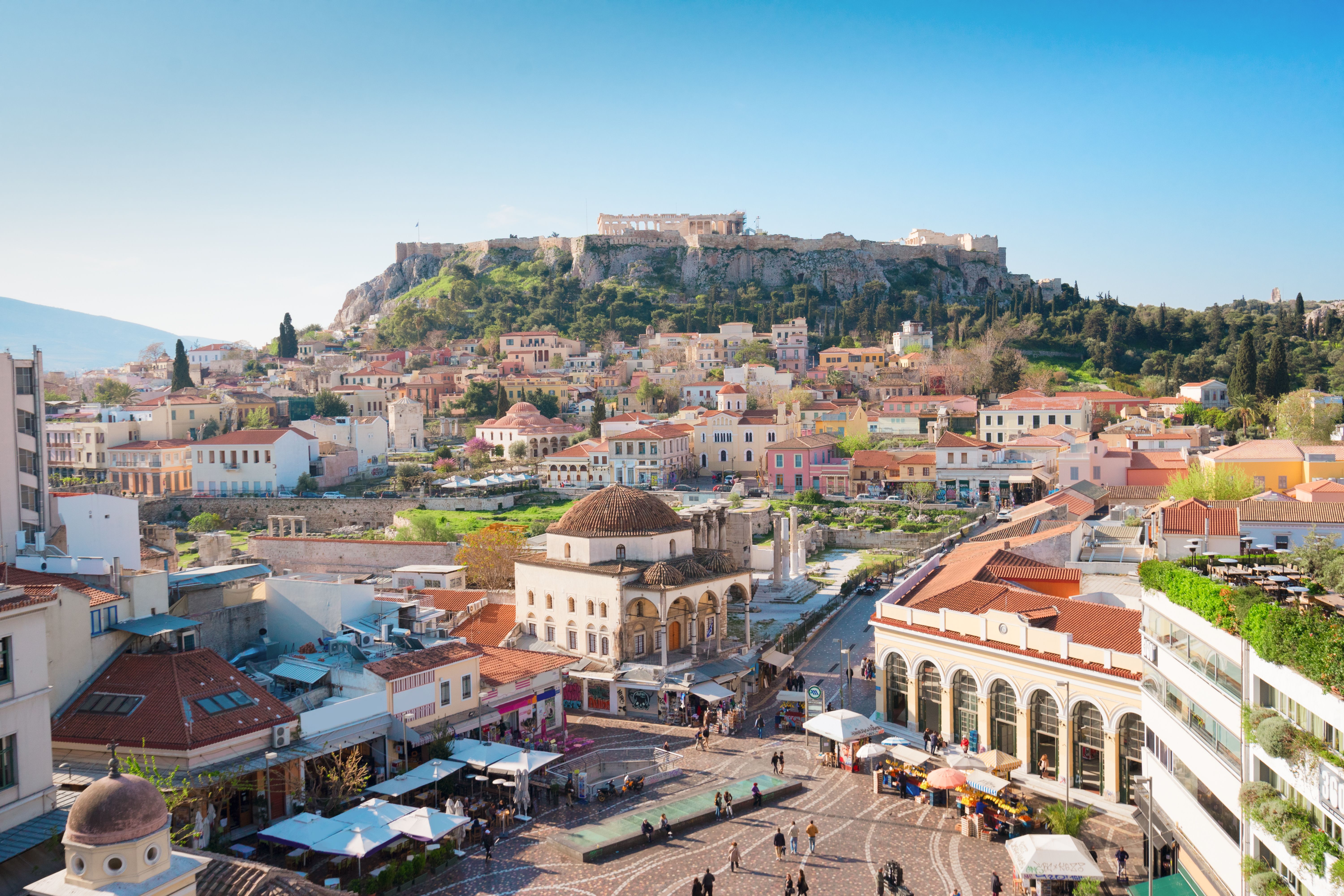 A view of Moanstiraki square with the Acropolis int he background in Athens