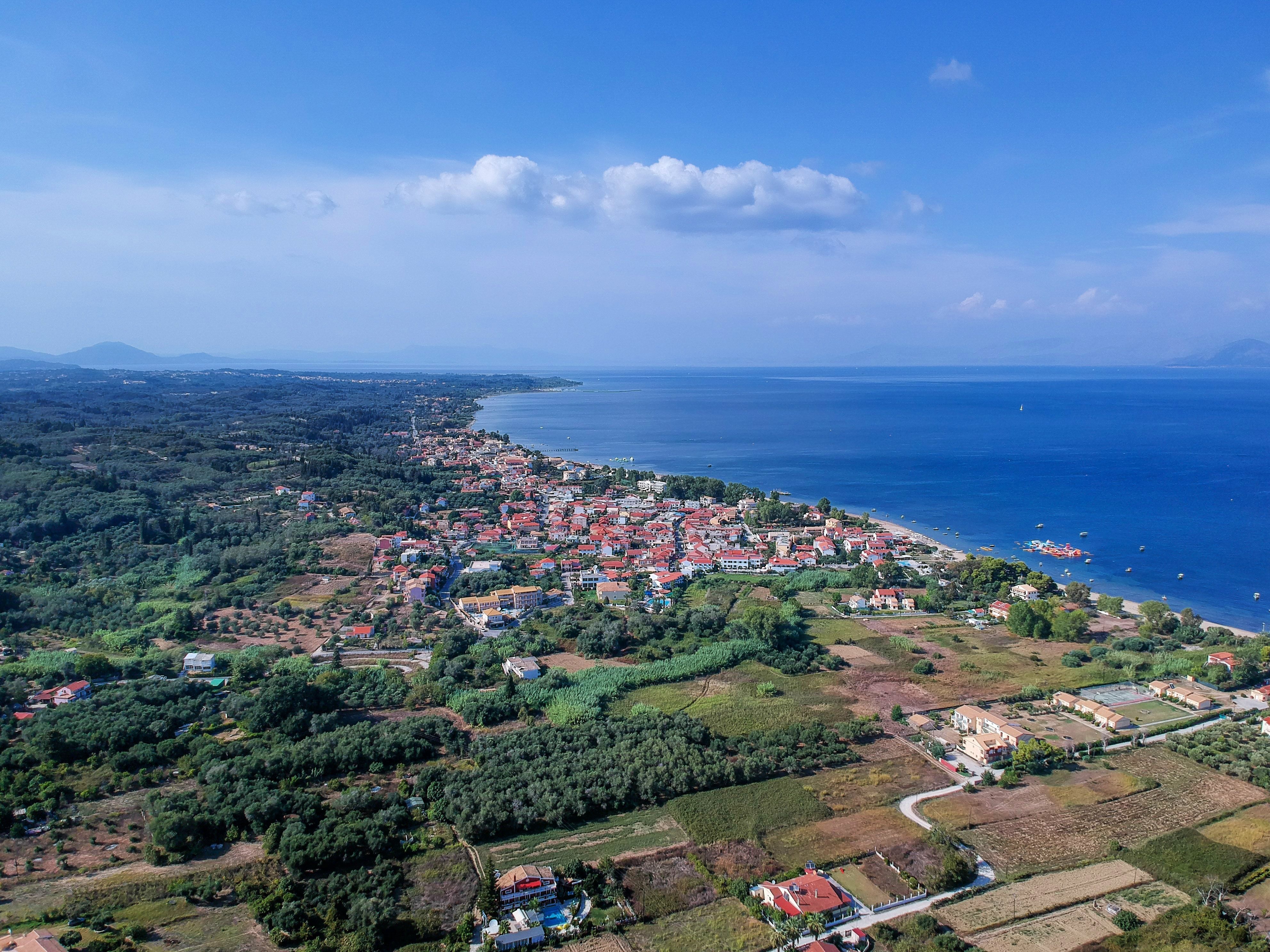 An aerial view of the seaside resort town of Kavos in Corfu